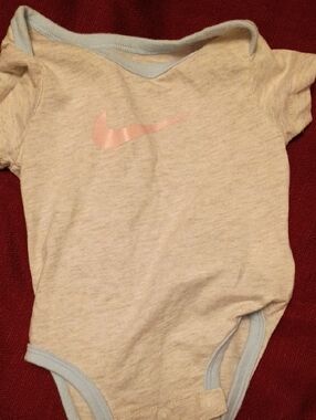 Nike Light Gray Baby Onesie with Pink Swoosh and Blue Trim